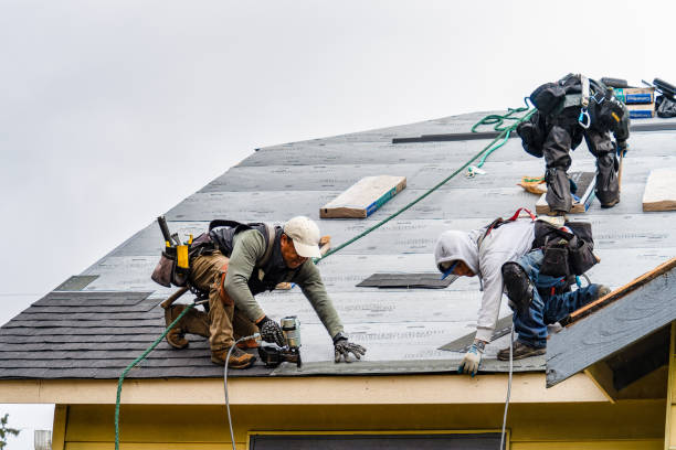 Professional Roofing technician working in Great River, NY